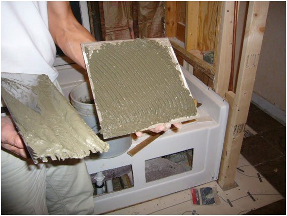 Applied mortar directly to tiles for electric heating sytem picture of Applied mortar directly to tiles for electric heating sytem