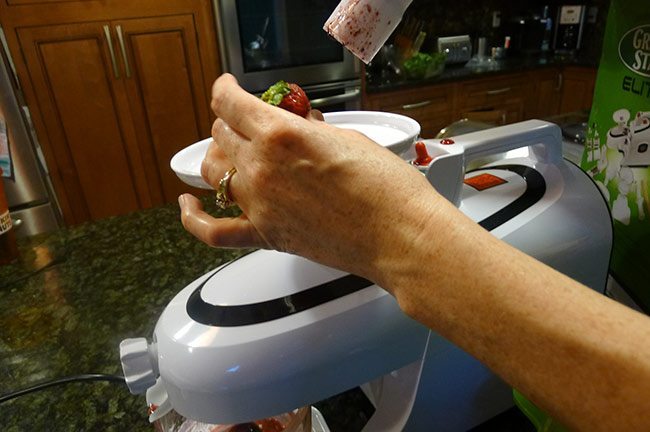 feeding a juicer