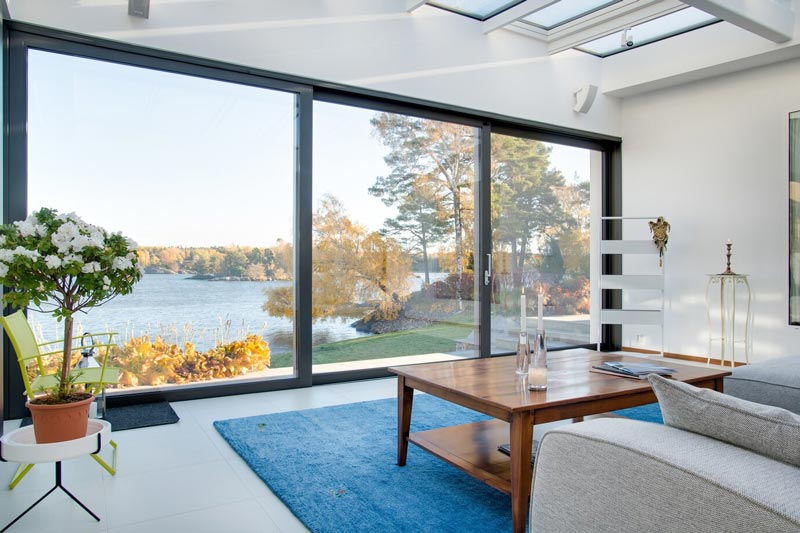 bright living room with expansive windows and natural light