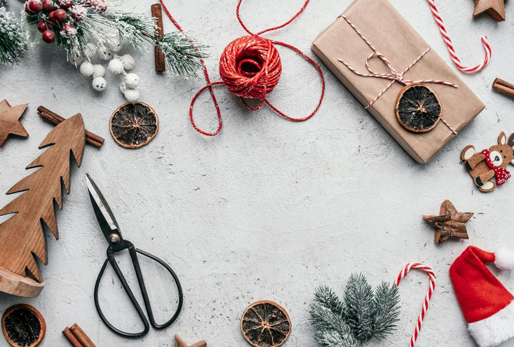 Christmas decoration tools on white surface
