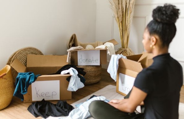 Person looking at labeled boxes