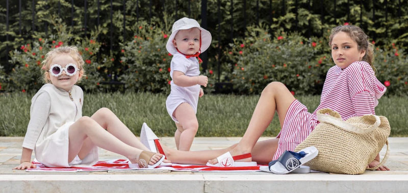 picture of three kids wearing Zubbi Kids clothing on a sunny day