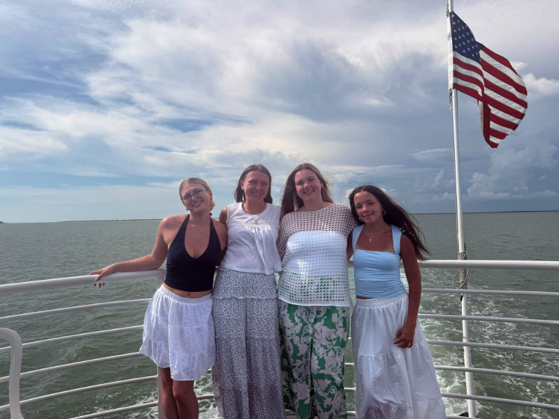 4 young women posing on Captiva Cruises Dolphin Cruise Review in Captiva Island, FL