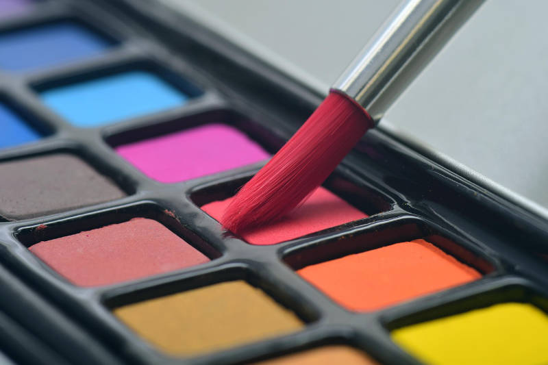 watercolor paint with paintbrush