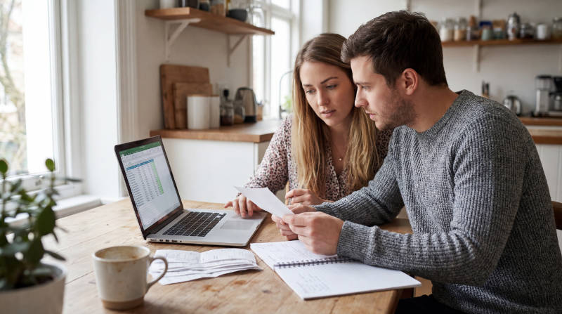 couple finances money home