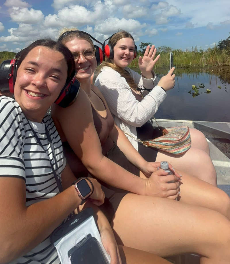3 young women on Buffalo Tiger Airboat