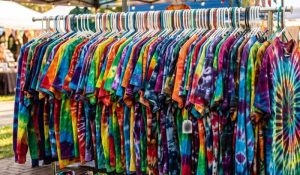 Tie Dye Shirts Hanging on a Rail