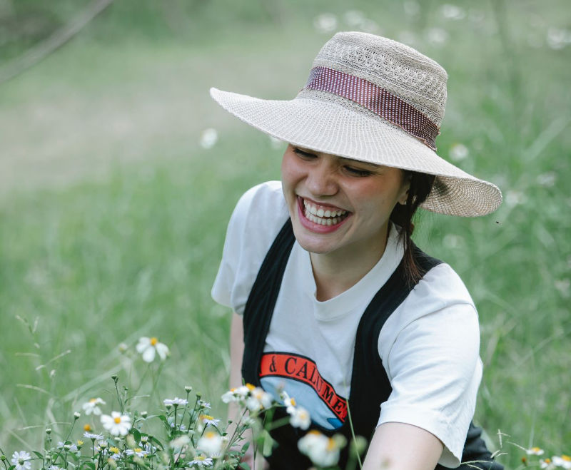 woman smiling in garden