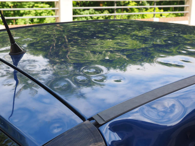 hail damage dent on car